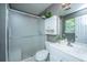 Bright bathroom with a frosted glass shower, toilet, vanity with storage, and modern fixtures at 505 Laurel Ridge Rd, North Charleston, SC 29418