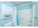 Neat bathroom features a combined tub and shower, toilet, storage cabinets, and new fixtures at 505 Laurel Ridge Rd, North Charleston, SC 29418