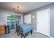 Dining area with sliding doors to the porch and a stylish chandelier at 505 Laurel Ridge Rd, North Charleston, SC 29418