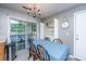 Dining area with sliding doors to the porch and an open laundry closet at 505 Laurel Ridge Rd, North Charleston, SC 29418