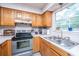 Bright kitchen with stainless steel appliances and plenty of counter space at 505 Laurel Ridge Rd, North Charleston, SC 29418
