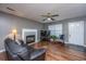 Inviting living room featuring a cozy fireplace and wood flooring at 505 Laurel Ridge Rd, North Charleston, SC 29418