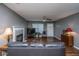 Bright living room with a fireplace, a ceiling fan and wood flooring at 505 Laurel Ridge Rd, North Charleston, SC 29418