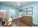 Bright and cozy office space with hardwood floors, comfortable seating, and organized shelving at 505 Laurel Ridge Rd, North Charleston, SC 29418