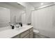Full bathroom featuring a single sink vanity, toilet, shower with curtain, and neutral wall paint at 5222 American Holly Ln, Ladson, SC 29456