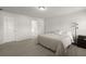 Cozy bedroom featuring light-colored walls, a bed, and a connecting bathroom with a doorway view at 5222 American Holly Ln, Ladson, SC 29456