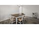 Dining area features a rustic wood table with seating for six at 5222 American Holly Ln, Ladson, SC 29456