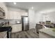 Bright kitchen features granite counters, stainless steel appliances, and ample cabinet storage at 5222 American Holly Ln, Ladson, SC 29456