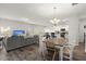 Spacious living room, dining area, and kitchen features an open concept layout at 5222 American Holly Ln, Ladson, SC 29456