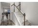 The staircase with carpet and a babygate has white banisters and dark wood trim at 5222 American Holly Ln, Ladson, SC 29456