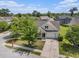 Aerial view of the home showing its location on a tree-lined street in a quiet residential neighborhood at 5400 Turning Tide, North Charleston, SC 29420