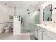 Bright bathroom featuring a glass enclosed shower, double sink vanity, and modern finishes at 5400 Turning Tide, North Charleston, SC 29420