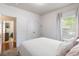 Bedroom featuring a queen bed, neutral walls, and a doorway at 5400 Turning Tide, North Charleston, SC 29420