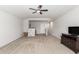 Spacious bonus room featuring neutral carpet, tv and ceiling fan at 5400 Turning Tide, North Charleston, SC 29420