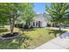 This charming home has manicured landscaping and a welcoming front porch, all enhancing its curb appeal at 5400 Turning Tide, North Charleston, SC 29420