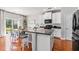 Modern kitchen with granite countertops, stainless steel appliances, an island, and a breakfast nook at 5400 Turning Tide, North Charleston, SC 29420