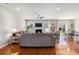 Bright living room features hardwood floors, a fireplace, and two sofas at 5400 Turning Tide, North Charleston, SC 29420