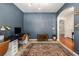 Bright home office space with custom desk, a patterned rug, and neutral color palette at 5400 Turning Tide, North Charleston, SC 29420