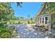 Outdoor patio with picnic table, grill, playground and beautiful landscaping at 5400 Turning Tide, North Charleston, SC 29420
