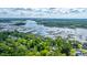 Scenic aerial shot highlighting waterfront properties and a serene view of marshland at 5692 Barbary Coast Rd, Hollywood, SC 29449