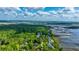 Breathtaking aerial view showcasing marsh and waterfront from this community near Charleston, SC at 5692 Barbary Coast Rd, Hollywood, SC 29449