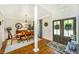 Elegant dining room with wood floors and a table set for dinner at 5692 Barbary Coast Rd, Hollywood, SC 29449