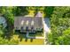 Aerial view of a home with a walkway and pristine landscaping at 5692 Barbary Coast Rd, Hollywood, SC 29449