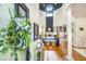 Elegant foyer with high ceilings, hardwood floors, and stylish decor at 5692 Barbary Coast Rd, Hollywood, SC 29449