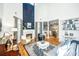 Spacious living room with fireplace, high ceilings, and an open floor plan at 5692 Barbary Coast Rd, Hollywood, SC 29449