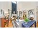 Bright and spacious living room with fireplace, soaring ceilings and wood floors at 5692 Barbary Coast Rd, Hollywood, SC 29449