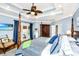 Comfortable main bedroom with a four-poster bed, private balcony, and walk-in closet at 5692 Barbary Coast Rd, Hollywood, SC 29449