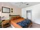 Cozy bedroom with a ceiling fan and access to an adjoining bathroom at 60 Fenwick # 936, Johns Island, SC 29455