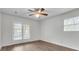 Bright bedroom features wood flooring, a ceiling fan, and a window with natural light at 615 Fairington Dr, Summerville, SC 29485