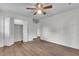 A charming bedroom offers wood floors and a spacious closet for ample storage at 615 Fairington Dr, Summerville, SC 29485