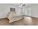 Bright bedroom featuring a ceiling fan, wood floors, and access to a balcony at 615 Fairington Dr, Summerville, SC 29485