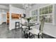 Elegant dining area featuring a modern table set with luxury chairs and a stylish chandelier at 615 Fairington Dr, Summerville, SC 29485