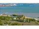 Panoramic aerial view of a coastal neighborhood with waterfront homes and a scenic coastline at 620 Clearview Dr, Charleston, SC 29412