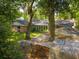 Backyard with shed, fire pit, and trees at 620 Clearview Dr, Charleston, SC 29412