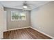 Bedroom with hardwood floors, a ceiling fan, and a window at 620 Clearview Dr, Charleston, SC 29412