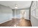 This bedroom features hardwood-style floors, soft blue walls and a view of the ensuite bathroom at 620 Clearview Dr, Charleston, SC 29412