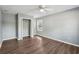 Bedroom with hardwood floors, a ceiling fan, closet, and window at 620 Clearview Dr, Charleston, SC 29412