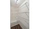 Walk-in closet with wire shelving and hardwood floors at 620 Clearview Dr, Charleston, SC 29412
