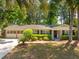 Charming single-story home with well-maintained landscaping and a two-car garage at 620 Clearview Dr, Charleston, SC 29412