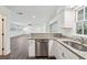 Bright kitchen featuring white cabinets, stainless steel appliances, and granite countertops at 620 Clearview Dr, Charleston, SC 29412