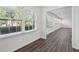 Bright living room featuring new flooring and ample natural light from large windows at 620 Clearview Dr, Charleston, SC 29412