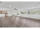 Open-concept living room featuring wood flooring, recessed lighting, and multiple windows at 620 Clearview Dr, Charleston, SC 29412