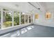 Enclosed sunroom surrounded by many windows for natural light at 620 Clearview Dr, Charleston, SC 29412