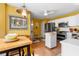Bright eat-in kitchen with stainless steel appliances, white cabinets, and a movable island at 675 Fair Spring Dr, Charleston, SC 29414