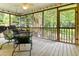 Screened porch with outdoor seating and a view of the yard at 675 Fair Spring Dr, Charleston, SC 29414