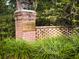 Community sign with brick wall and well-maintained landscaping at 675 Fair Spring Dr, Charleston, SC 29414